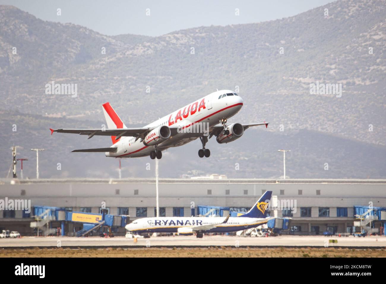 Lauda Europe low cost airline Airbus A320 airplane departs from ...