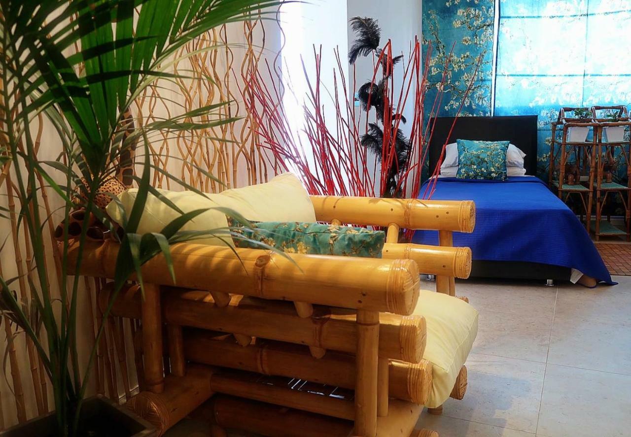 Chambre Triple avec Terrasse
